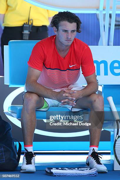 Oliver Anderson of Australia looks on in his Junior Boys' Singles Final match against Jurabeck Karimov of Uzbekistan during the Australian Open 2016...