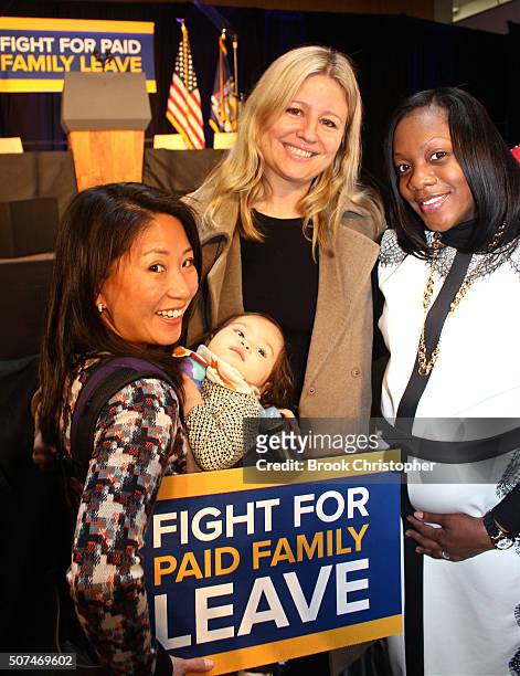 Supporters of paid family leave attend a rally where U.S. Vice President Joe Biden spoke on paid family leave with NY Governor Andrew Cuomo who also...