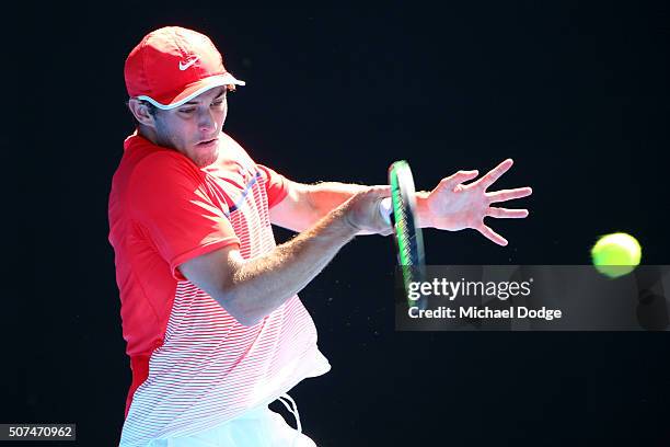 Oliver Anderson of Australia plays a forehand in his Junior Boys' Singles Final match against Jurabeck Karimov of Uzbekistan during the Australian...