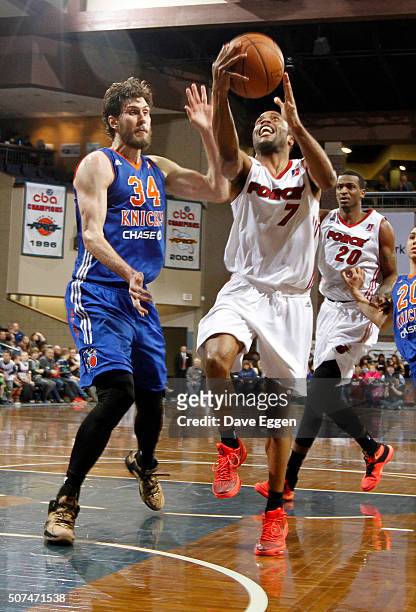 Tre Kelley from the Sioux Falls Skyforce takes the ball to the basket against Jordan Bachynski from the Westchester Knicks at the Sanford Pentagon...