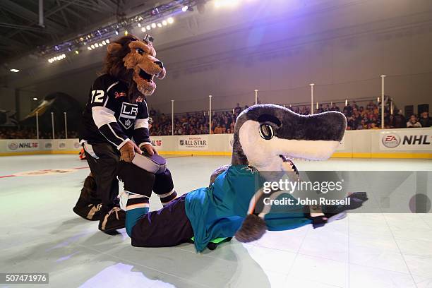 The Los Angeles Kings mascot, Bailey, and the San Jose Sharks mascot, SJ Sharkie, compete in the NHL Mascot Showdown during day two of the 2016 NHL...