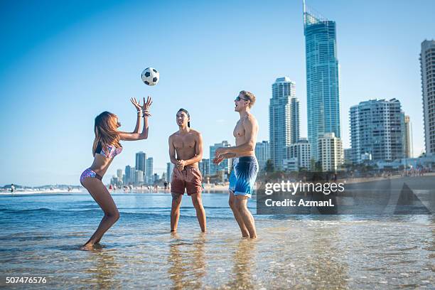 summer days with friends are always fun! - gold coast australia beach stock pictures, royalty-free photos & images