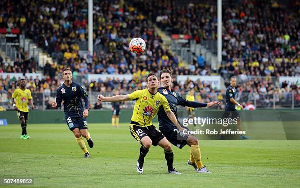 Michael McGlinchey of the Wellington Phoenix keeps an eye on the ball during the round 17 A-League match between the Wellington Phoenix and the...