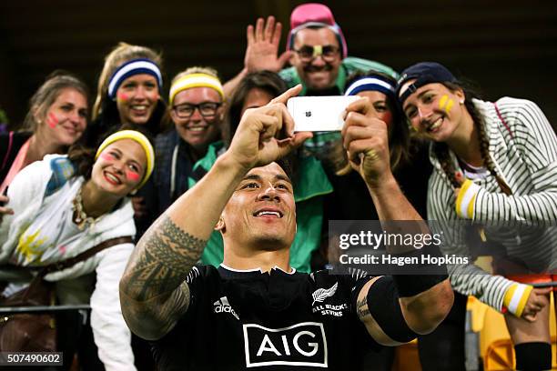Sonny Bill Williams of New Zealand takes a selfie with fans during the 2016 Wellington Sevens at Westpac Stadium on January 30, 2016 in Wellington,...