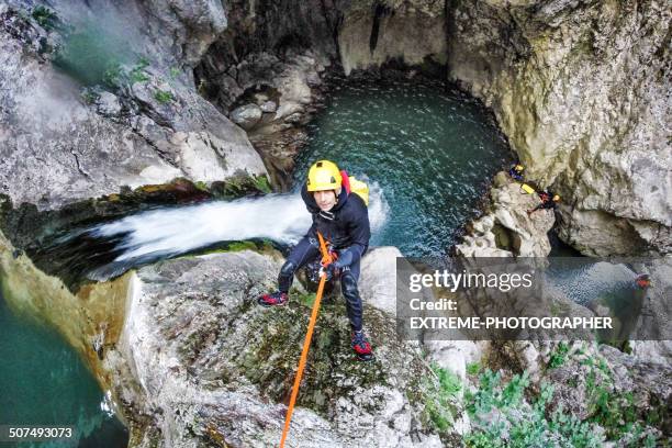 moving down the waterfall - canyoning bildbanksfoton och bilder