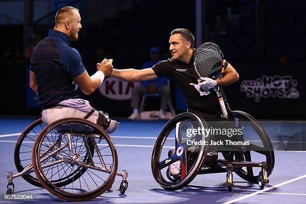 Stephane Houdet and Nicolas Peifer of France celebrate winning the Men's Wheelchair Doubles Final at the Australian Open 2016 Wheelchair...