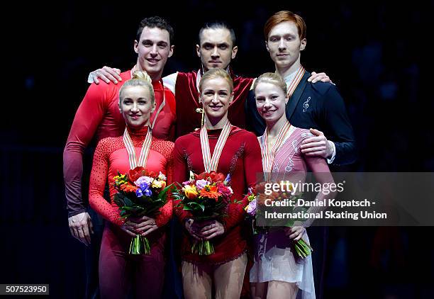 Silver medalists Aliona Savchenko and Bruno Massot of Germany , gold medalists Tatiana Volosozhar and Maxim Trankov of Russia and Evgenia Tarasova...