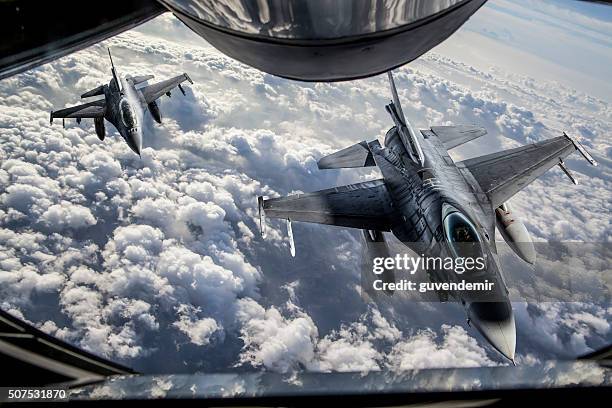 mid-air refueling - war plane stock pictures, royalty-free photos & images