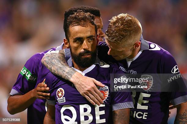 Diego Castro of the Glory celebrates a goal from a penalty kick with Jamal Reiners and Andy Keogh during the round 17 A-League match between Perth...