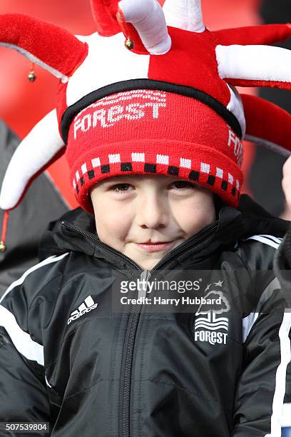 Nottingham Forest fan wears a red and white jester's hat before the Emirates FA Cup Fourth Round match between Nottingham Forest and Watford at the...