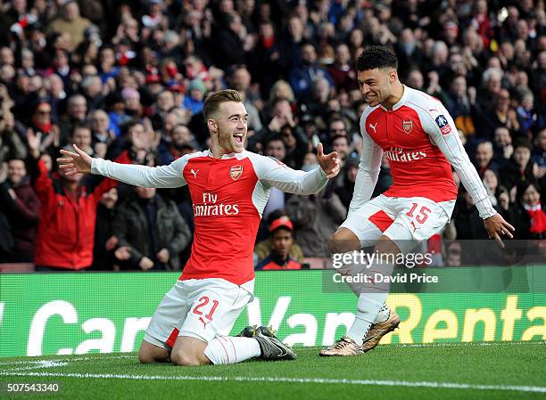 Calum Chambers celebrates scoring a goal for Arsenal with alex Oxlade-Chamberlain during the match between Arsenal and Burnley in the FA Cup 4th...