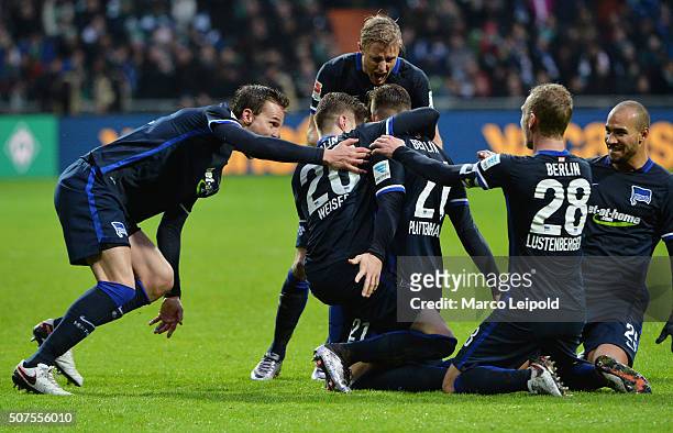 Sebastian Langkamp, Mitchell Weiser, Marvin Plattenhardt, Fabian Lustenberger and John Anthony Brooks of Hertha BSC celebrate after scoring the 0:2...