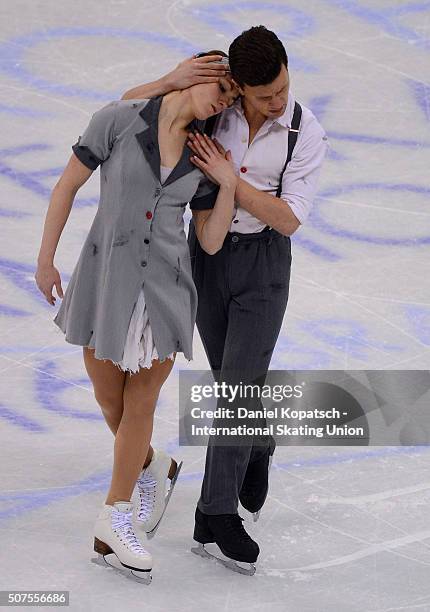 Charlene Guignard and Marco Fabbri of Italy perform during Ice Dance Free Dance on day four of the ISU European Figure Skating Championships 2016 on...