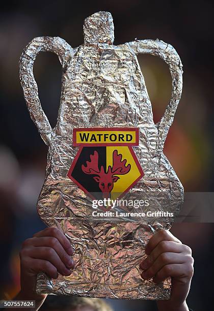 Watford fan holds a 'tin foil' trophy prior to The Emirates FA Cup fourth round between Nottingham Forest and Watford at City Ground on January 30,...