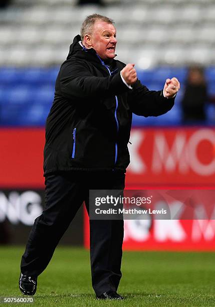 Steve Evans, manager of Leeds United celebrates his teams win over Bolton Wanderers during The Emirates FA Cup Fourth Round match between Bolton...