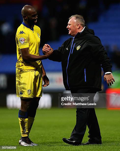 Steve Evans, manager of Leeds United celebrates his teams win over Bolton Wanderers with Souleymane Doukara during The Emirates FA Cup Fourth Round...