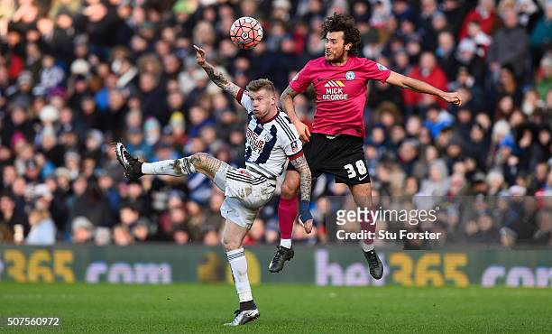 James McClean of West Bromwich Albion and Lawrie Wilson of Peterborough United compete for the ball al during The Emirates FA Cup Fourth Round match...