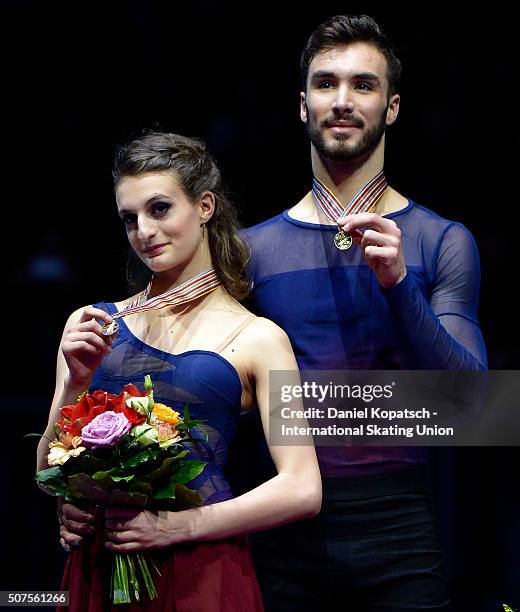 Gold medalists Gabriella Papadakis and Guillaume Cizeron of France pose during the medal ceremony of Ice Dance on day four of the ISU European Figure...