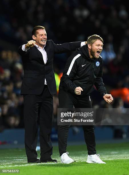 Manager Graham Westley of Peterborough celebrates his team's second goal by Jon Taylor during the Emirates FA Cup Fourth Round match between West...