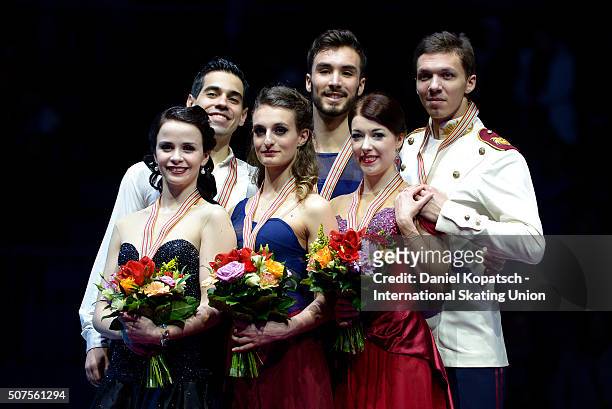 Silver medalists Anna Cappellini and Luca Lanotte of Italy , gold medalists Gabriella Papadakis and Guillaume Czieron of France and bronze medalists...