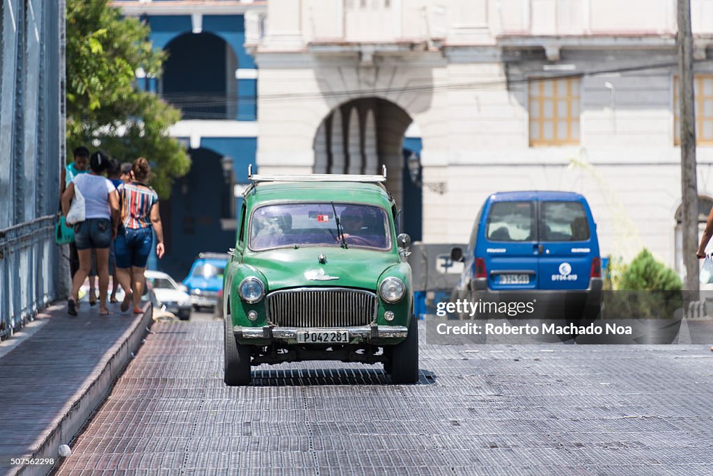 Old American cars in the Iron bridge in Matanzas which is a...