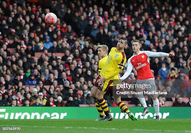 Calum Chambers scores the 1st Arsenal goal during the The Emirates FA Cup Fourth Round match between Arsenal and Burnley at Emirates Stadium on...