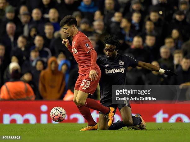 Alex Song of West Ham United in action with Liverpool's Joao Carlos Teixeira during The Emirates FA Cup Fourth Round match between Liverpool and West...