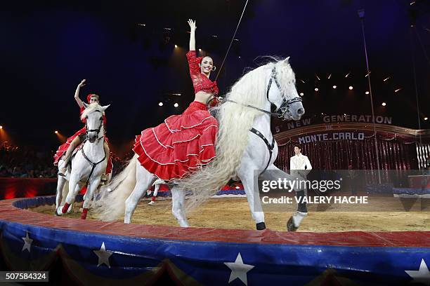 German performer Rene Casselly Jr performs with horses during the 5th New Generation circus competition for young artists in Monaco on January 30,...