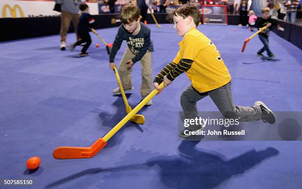 Young hockey fans play at the 2016 NHL All-Star NHL Fan Fair at the Music City Center as part of the 2016 NHL All-Star Weekend on January 29, 2016 in...