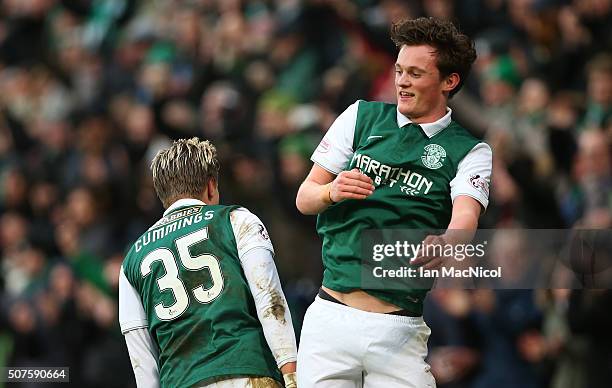 Jason Cummings of Hibernian celebrates his goal with Liam Henderson of Hiberian during the Scottish League Cup Semi final match between Hibernian and...