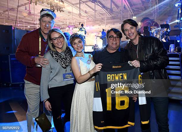 Stephen Gudis of The Production Department, LLC. Presents Clare Bowen of ABC's "Nashville" with a jersey during the 2016 NHL All-Star Fan Fair - Day...