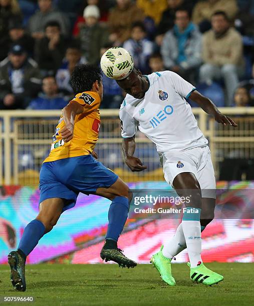 Porto's forward Silvestre Varela with GD Estoril Praia's defender Anderson Luis in action during the Primeira Liga match between GD Estoril Praia and...