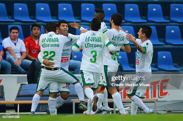 Silvio Romero of Chiapas celebrates with teammates after scoring the first goal of his team during the fourth round match between Cruz Azul and...