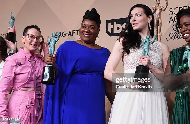 Lori Petty, Adrienne C. Moore, Laura Prepon, and Uzo Aduba, winners of the Outstanding Performance by an Ensemble in a Comedy Series Award, pose in...