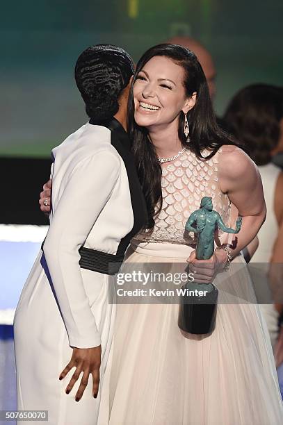 Actress Laura Prepon and the cast of 'Orange Is The New Black' accept the award for Oustanding Ensemble in a Comedy Series onstage during The 22nd...