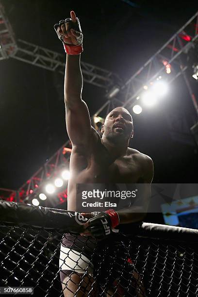Anthony Johnson of the United States celebrates his win by TKO against Ryan Bader of the United States in the first round of their light heavyweight...