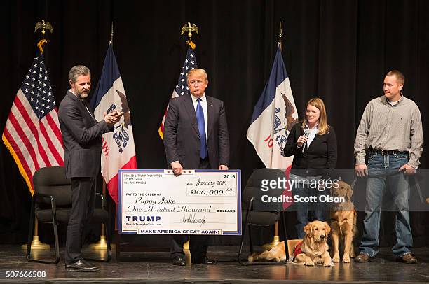 Republican presidential candidate Donald Trump joins Jerry Falwell, Jr., president of Liberty University, for a campaign rally at the Adler Theatre...