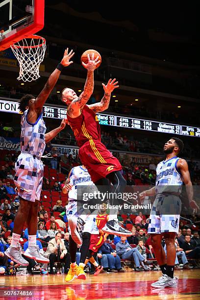 Nick Minnerath of the Canton Charge spins around for a shot against Alex Stepheson of the Iowa Energy in an NBA D-League game on January 30, 2016 at...