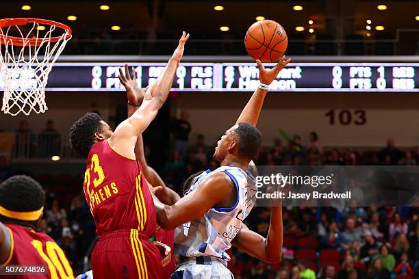 Traevon Jackson of the Iowa Energy shoots over DJ Stephens of the Canton Charge in an NBA D-League game on January 30, 2016 at the Wells Fargo Arena...