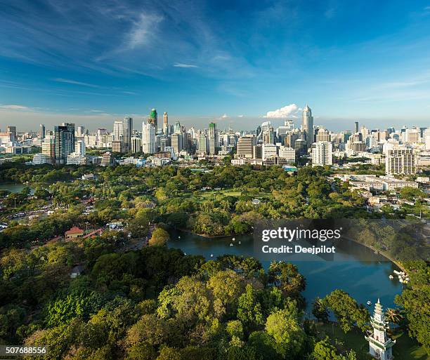 lumphini park and the downtown bangkok city skyline thailand - lumpini park bildbanksfoton och bilder