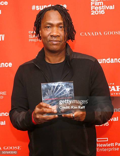 Director Roger Ross Williams poses with the Directing Award: U.S. Documentary for the film Life, Animated backstage at the Sundance Film Festival...