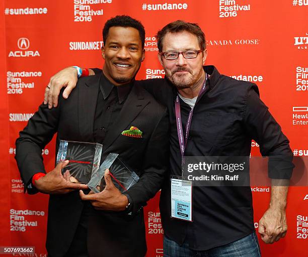 Director Nate Parker, winner Audience Award: U.S. Dramatic and U.S. Grand Jury Prize: Dramatic for 'The Birth of a Nation' poses with Sundance Film...