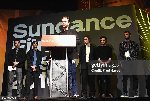 Director Michal Marczak accepts the Directing Award: World Cinema Documentary for the film All These Sleepless Nights, onstage at the Sundance Film...