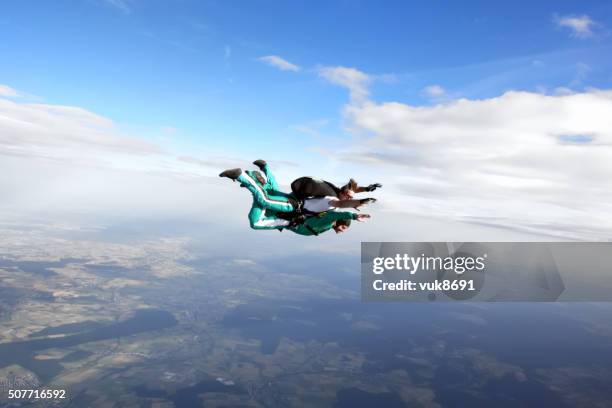 tandem skydiving - tandem stock pictures, royalty-free photos & images