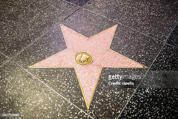 empty star shape at the walk of fame - walk of fame stock pictures, royalty-free photos & images