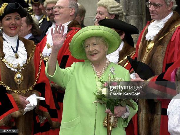 Queen Elizabeth, the Queen Mother, meeting with Cinque Port Mayors at the Town Hall in Dover where she was presented with a scroll and birthday card...