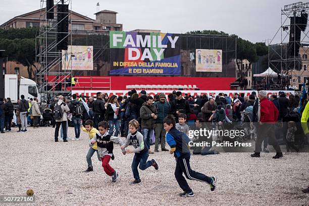 Children playing during family day in Rome. "Family Day", an event organized in defense of traditional Catholic family values and opposed to the...