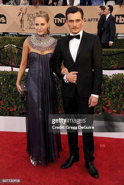 Oreal Paris Spokesperson Aimee Mullins and actor Rupert Friend arrive at the 22nd Annual Screen Actors Guild Awards at The Shrine Auditorium on...