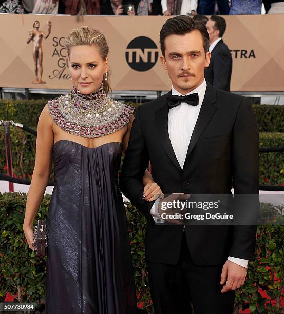 Oreal Paris Spokesperson Aimee Mullins and actor Rupert Friend arrive at the 22nd Annual Screen Actors Guild Awards at The Shrine Auditorium on...