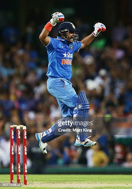 Suresh Raina of India celebrates hitting the winning runs on the last ball of the match during the International Twenty20 match between Australia and...